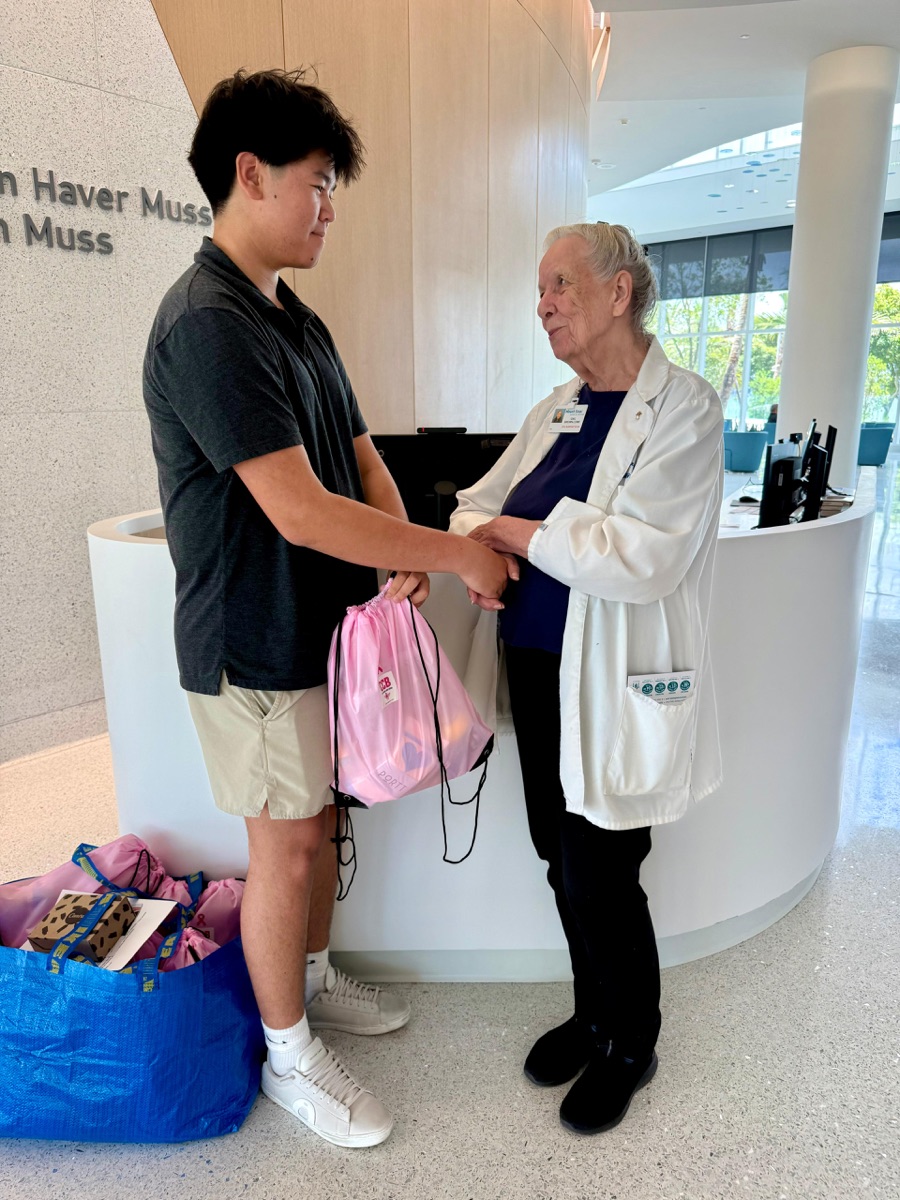 Brandon delivering baskets to Gail Brown at Mount Sinai in 2026